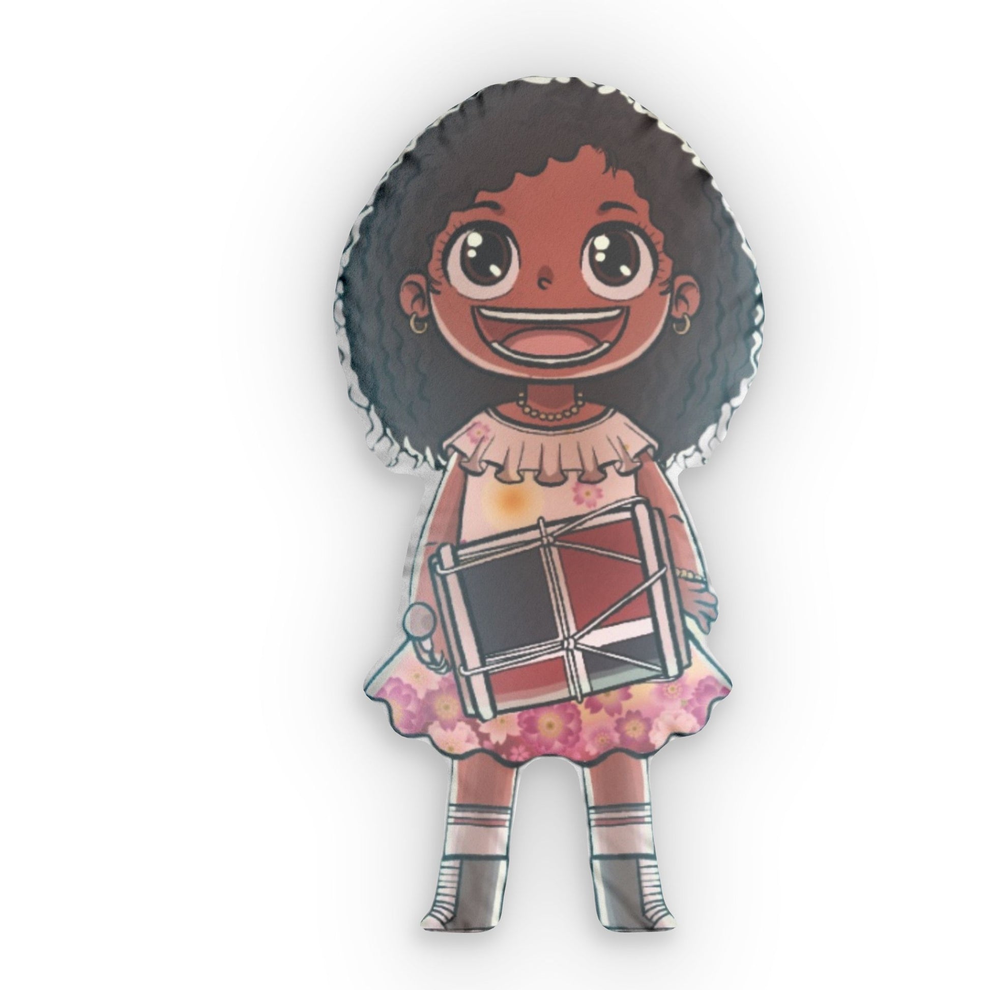 Throw pillow shaped like a smiling girl with curly hair wearing a pink dress and holding a wrapped gift.