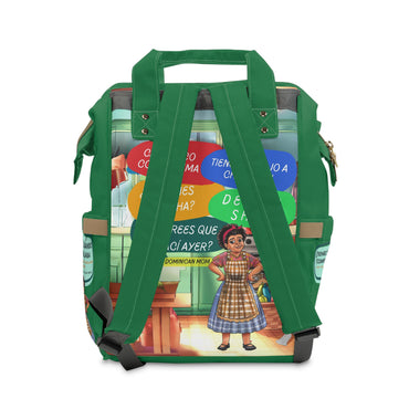 Multicolor Dominican Mom backpack with green straps and playful cartoon design on front panel.