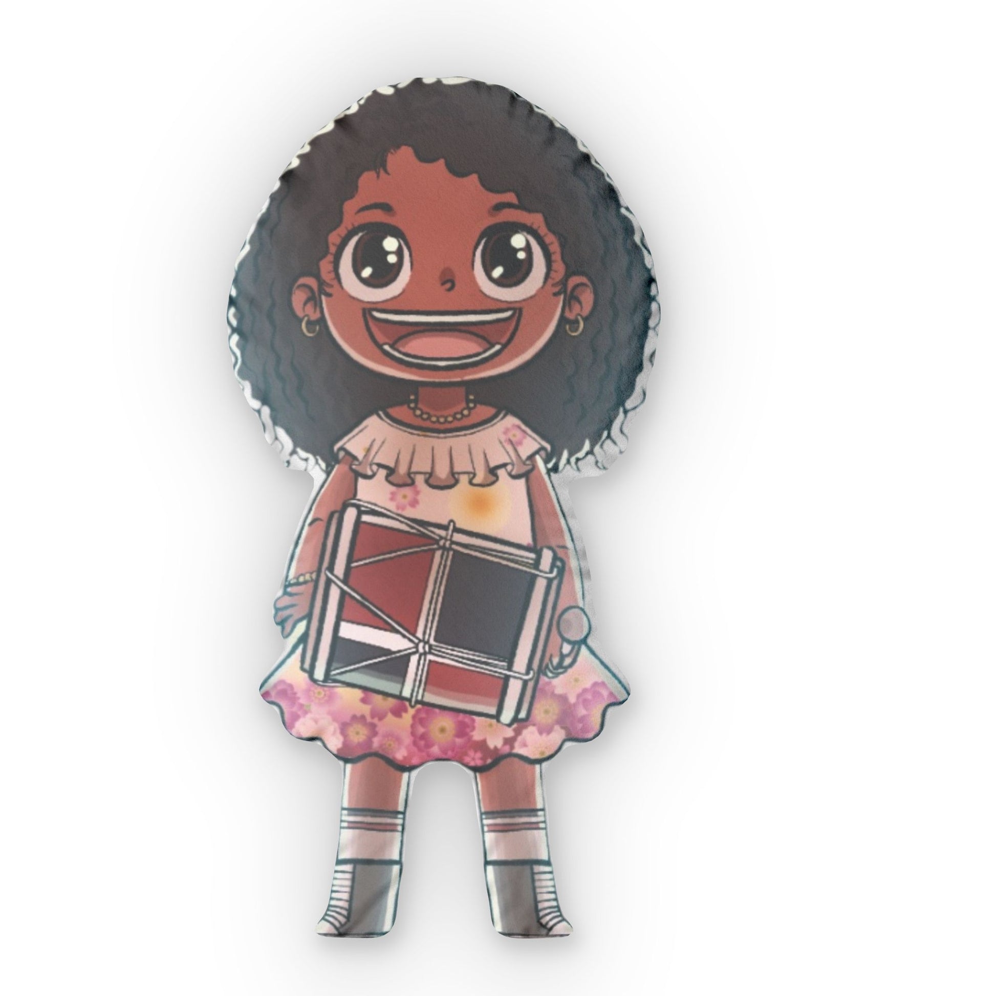 Throw pillow shaped like a smiling girl with curly hair wearing a pink dress and holding a drum.